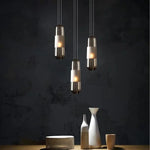 lampes suspendues modernes minimalistes gris fumé ambre transparent éclairage salon chambre étude