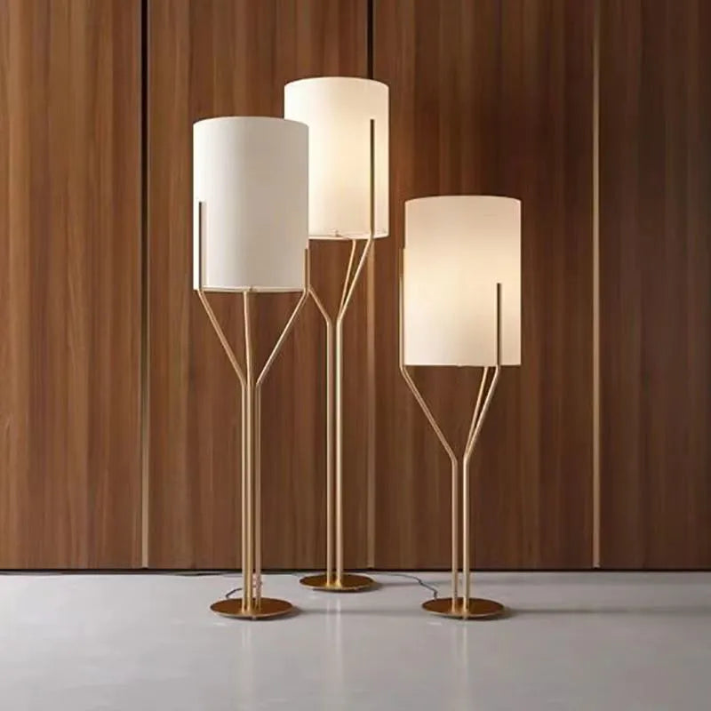 lampe sol or blanc abat jour lisse minimaliste structure métal doré branchée moderne
