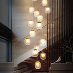 suspension lumineuse moderne transparent dorée fine élégante chaînes métalliques ampoules incluses