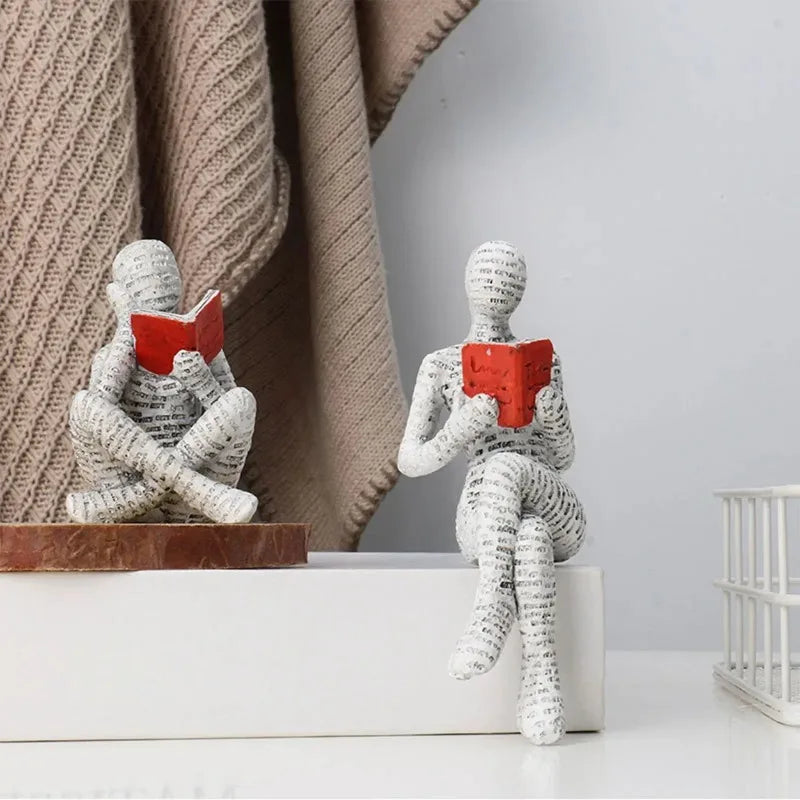 statue résine femme lisant blanc noir livre rouge texture papier imprimé minimaliste décoration erotique