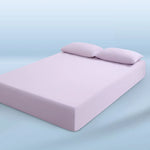 parure lit bleu clair drap housse élastique deux oreillers coton doux chambre moderne
