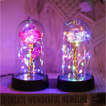 lampe led rose stabilisée dorée feuilles vertes moderne nuit multicolore base noire verre transparent