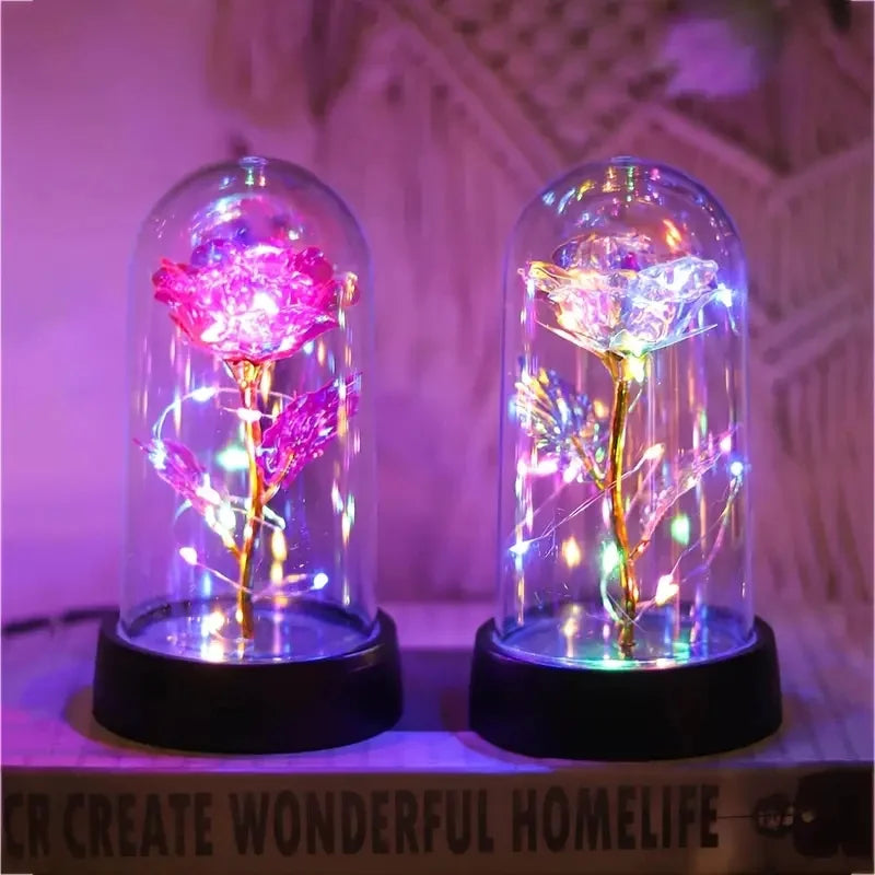 lampe led rose stabilisée dorée feuilles vertes moderne nuit multicolore base noire verre transparent