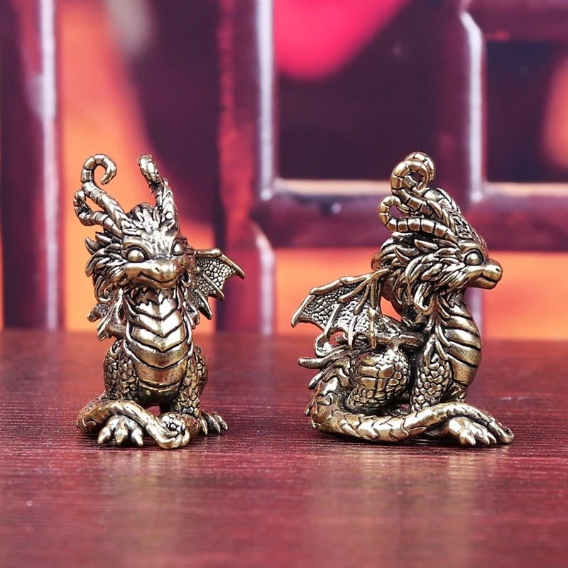 statues dragons dorées détaillées artisanales intérieur ornement métallique fantastique mythologie