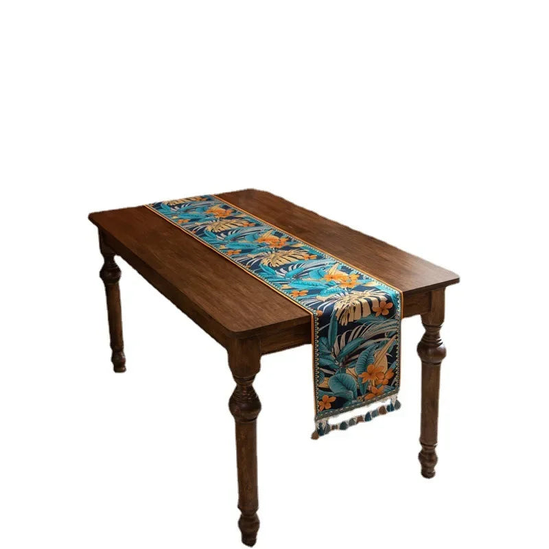 nappe bohème motifs floraux franges couleur bleu foncé orange verte marron rustique
