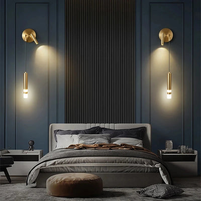 Applique murale LED créative or et noir suspendue dans une chambre à coucher moderne