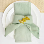 serviettes table coton vert pastel texture rugueuse rustique élégant papillon doré épingle blé