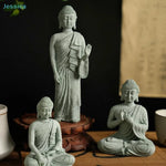 statues bouddha vert clair texture marbre classique décoration intérieure zen espace spiritualité pierre socle