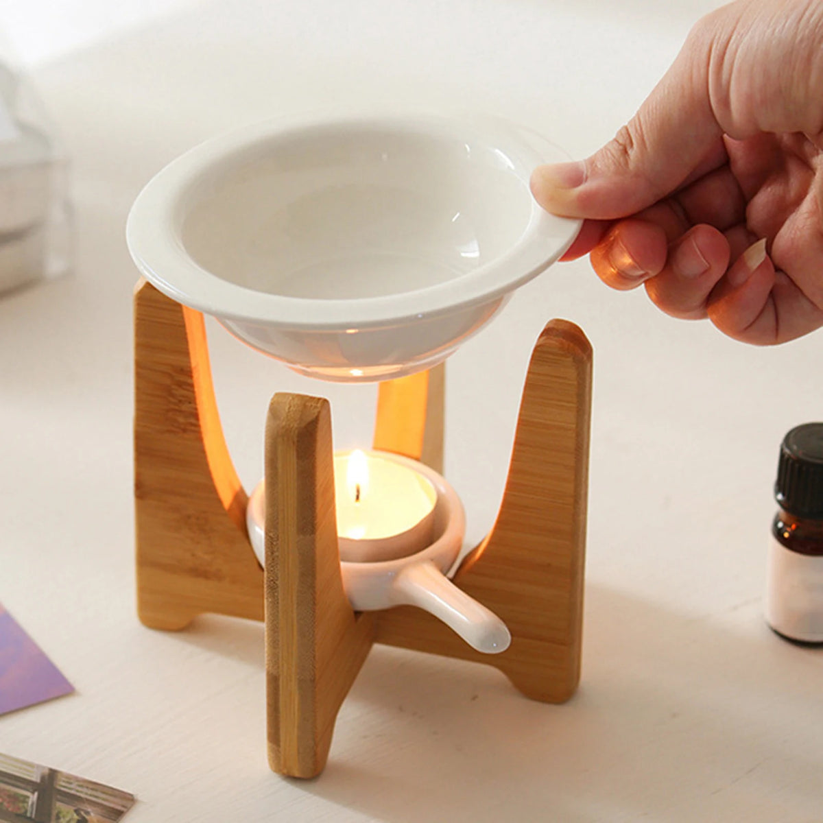 diffuseur huiles essentielles céramique moderne bol blanc poignée bougie parfumée salon minimaliste
