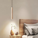 Suspension lumineuse moderne pierre marbrée beige clair foncé texture naturelle minimaliste pendentif cordon