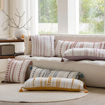 coussin moderne rayé 30x90cm pompons dorés bohème arc ciel pastel