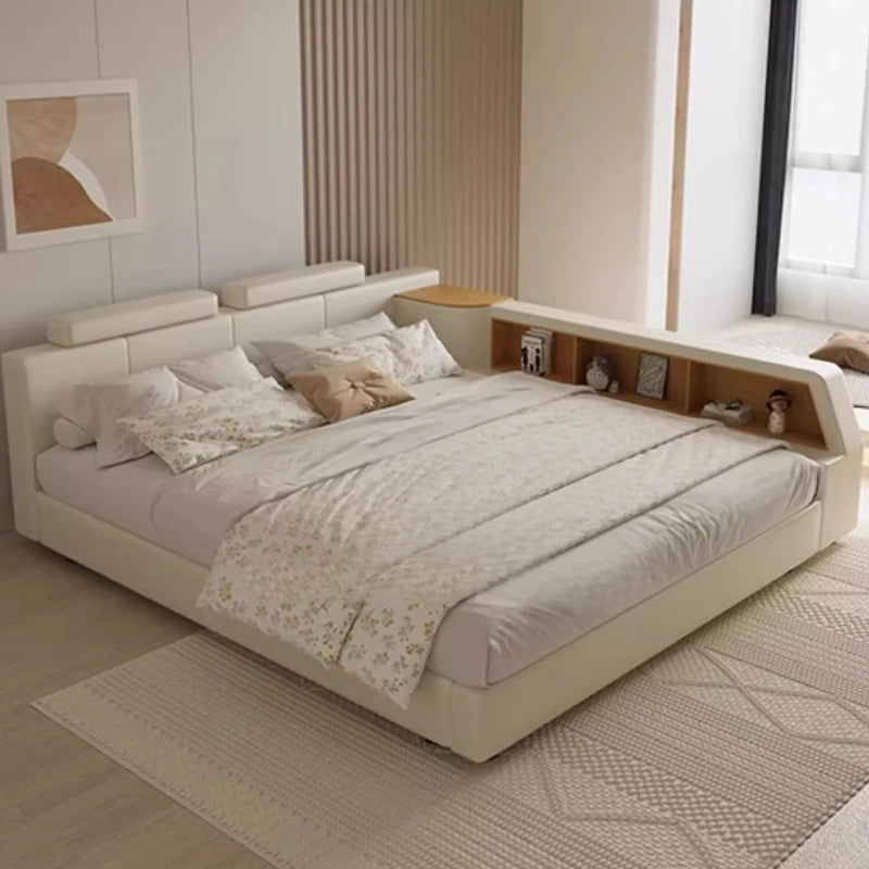 lit moderne tête lit rangements matelas draps blancs oreillers coussins table chevet chambre