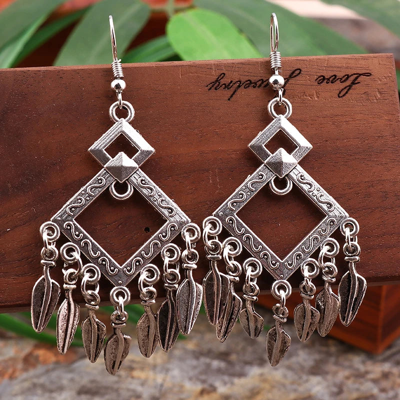 boucles d'oreilles pendantes argentées géométriques ethniques bohèmes pendeloques plumes party romantiques trendy femmes