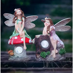 statuette féerique verte rouge blanc papillon champignon roche solaire nuit extérieur decoration cour
