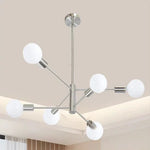 lustre moderne 10 ampoules doré noir chrome sphères blanches structure métallique scandinave