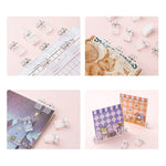 clips plastique transparent rose adhésifs muraux suspendus boîte compartiments protracteur règle feuilles
