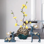 vases statuettes cerfs cygnes dauphins plateau deux étages distributeur serviettes baleine moderne élégant or