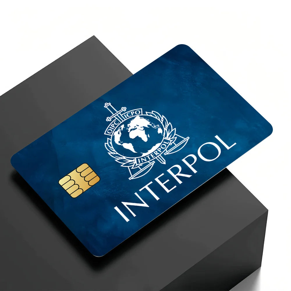 stylo bille bleu interpol logo globe épée carte bancaire