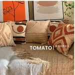 taies d'oreiller géométriques brodées boho chic couleurs beige orange gris franges respectueuses environnement decoration