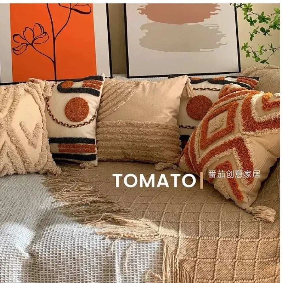 taies d'oreiller géométriques brodées boho chic couleurs beige orange gris franges respectueuses environnement decoration