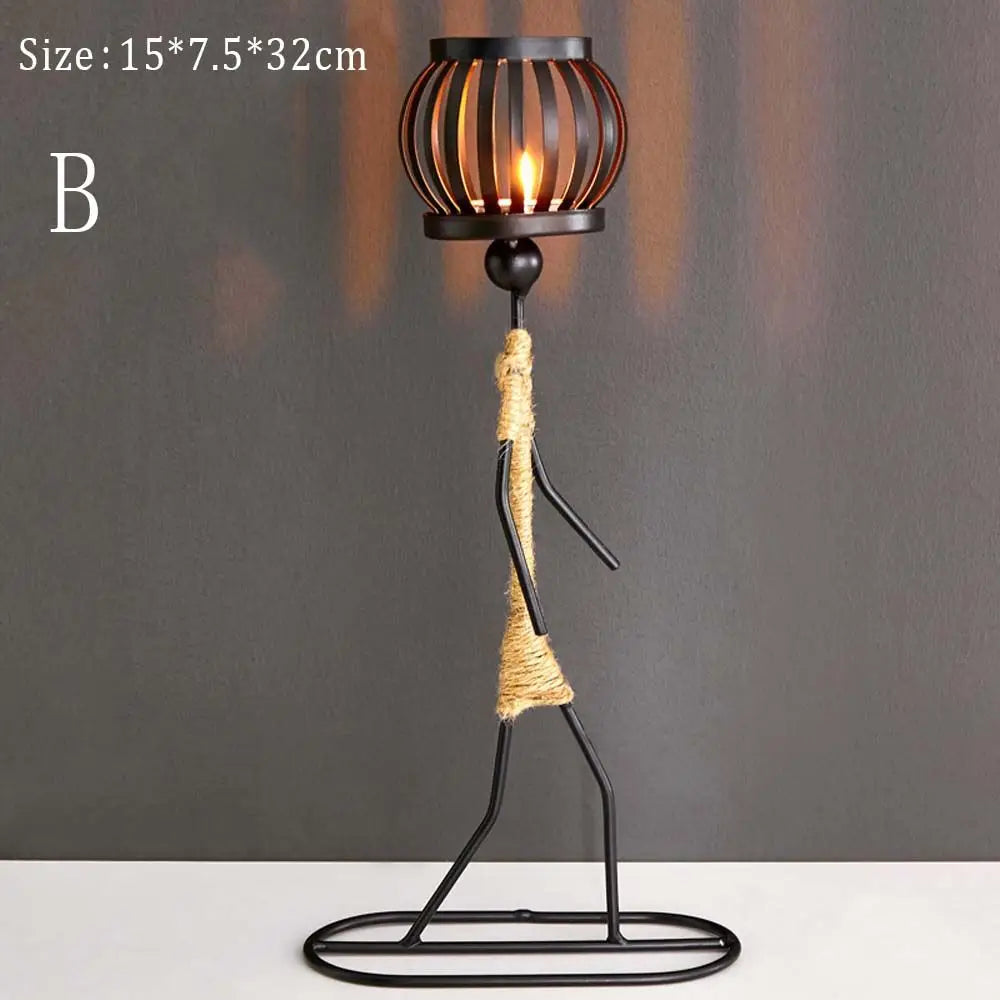 lanterne moderne minimaliste métal noir suspension bougie décoration intérieure contemporain porte chandelier abstrait