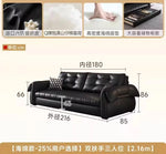 canapé lit noir simili cuir moderne coussin décoratif table basse tapis couverture