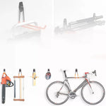 support mural vélo orange noir vis simple solide pragmatique garage outils jardin