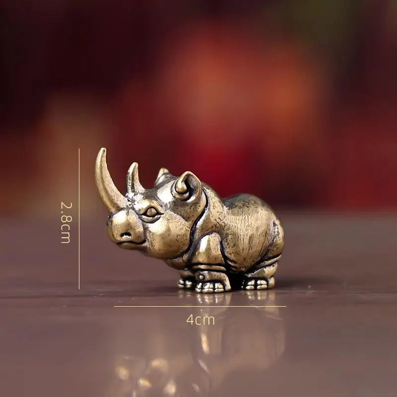 figurines animales bronze cuivre détails sculptés rhinocéros hippopotame éléphant plateau bois africain