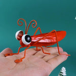 figurine insecte sauterelle verte bleu résine brillante artisanale moderne extérieur décoration jardin