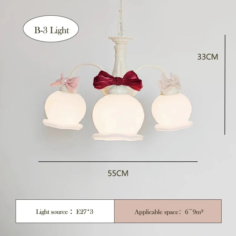 chandelier suspension vert pâle rubans roses abat jour translucides chambre enfant romantique