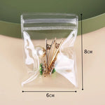 boîte rangement bijoux transparente moderne pratique zip boucles oreilles bracelets colliers accessoires