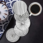 coasters bois blanc rayures noires spirales modernes décoration intérieure 14+