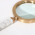 décoration vintage loupe or marron poignée cuir serpent transparente élégante maison