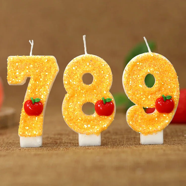 bougies numeriques jaune paillette pomme rouge anniversaire decoratif thème feuille verte paillettes dorées tringle