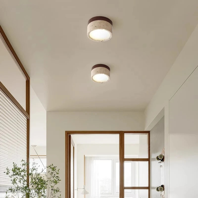 lampe moderne minimaliste bois pierre texture naturelle beige brun foncé éclairage led murale