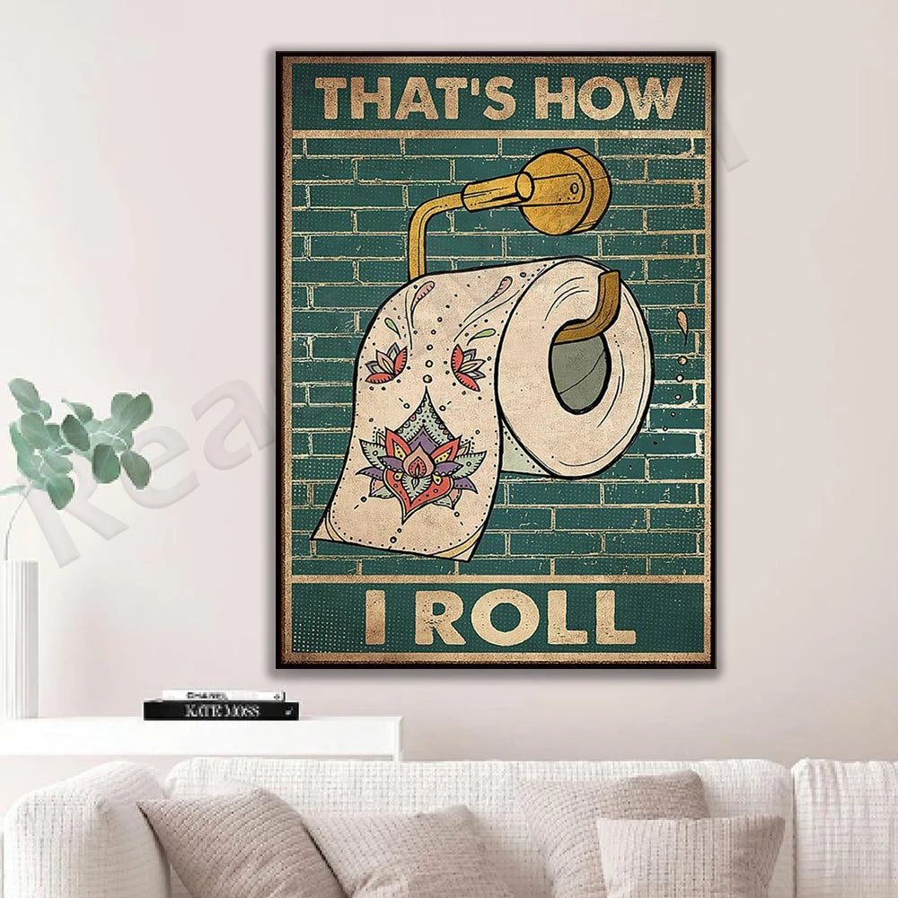 Affiches murales décorative montrant un rouleau de papier toilette avec un motif ornemental coloré et un texte humoristique "C'est ainsi que je roule".