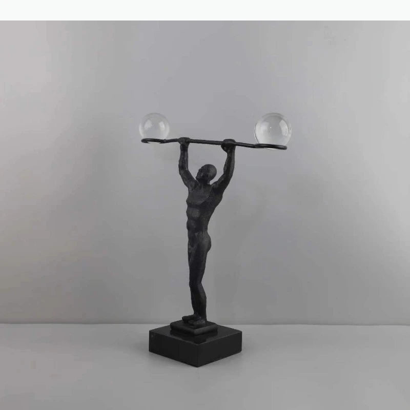 sculpture décorative moderne noir transparent figure humaine musclee sphères lisses maison art deco