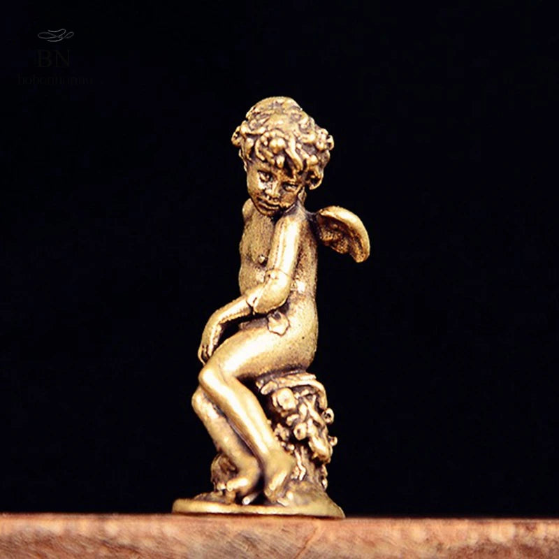 statue ange enfant dorée ailes base végétale renaissance ornement décoration intérieur classique erotique miniature