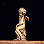statue ange enfant dorée ailes base végétale renaissance ornement décoration intérieur classique erotique miniature