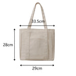 sac main noir beige moderne casual toile uni poche fermeture éclair poignées détachables