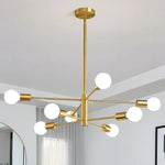lustre moderne 10 ampoules doré noir chrome sphères blanches structure métallique scandinave