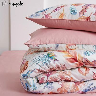 Ensemble de literie 4 pièces en percale coton égyptien couleur prune sur lit