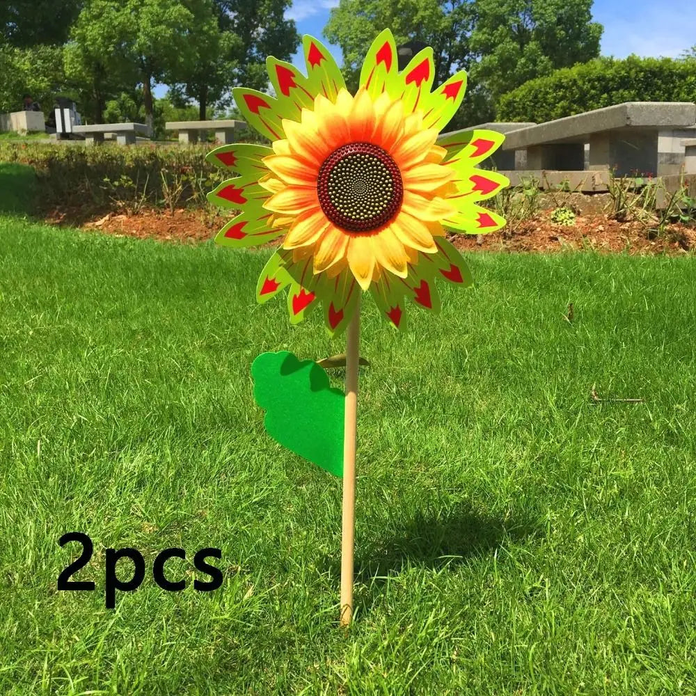 décoration extérieure fleur artificielle jaune rouge bleu vert rayonnante pétale verte tringle jardin cour