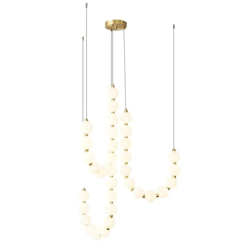suspension lumineuse moderne minimaliste cactus blanc opalescent câbles dorés chambre salon