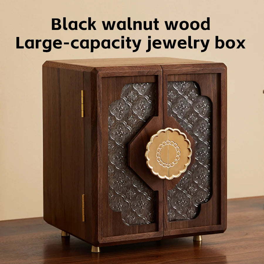 boîte bijoux noire tiroirs velours élégante motifs gravés texture bois vintage vis fixations compartments