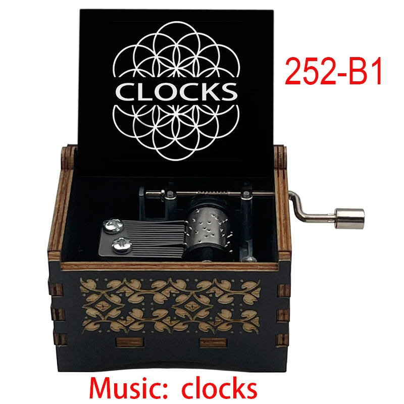 boîte musicale bois naturel motifs floraux 18 tons vintage manivelle horlogerie artisanale