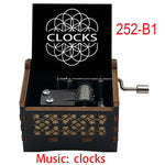boîte musicale bois naturel motifs floraux 18 tons vintage manivelle horlogerie artisanale