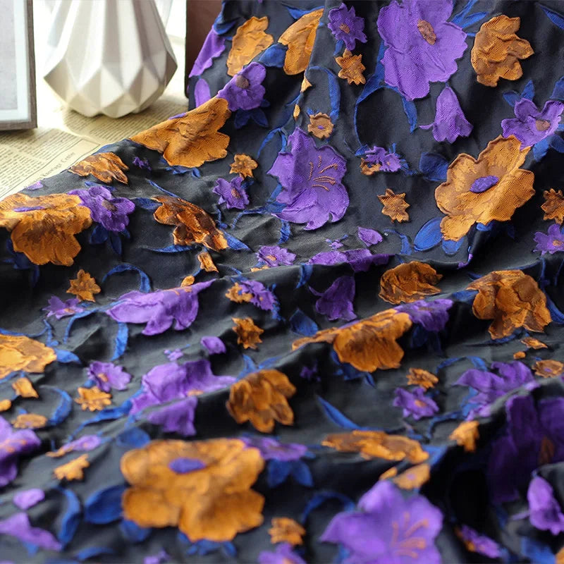 tissu semi transparent floral relief noir violet orange décoration couture jacquard polyester respectueux environnement
