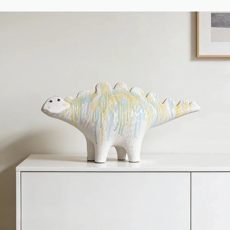 statue décorative moderne dinosaure blanc jaune bleu clair texturé statue chaton blanc noir orange