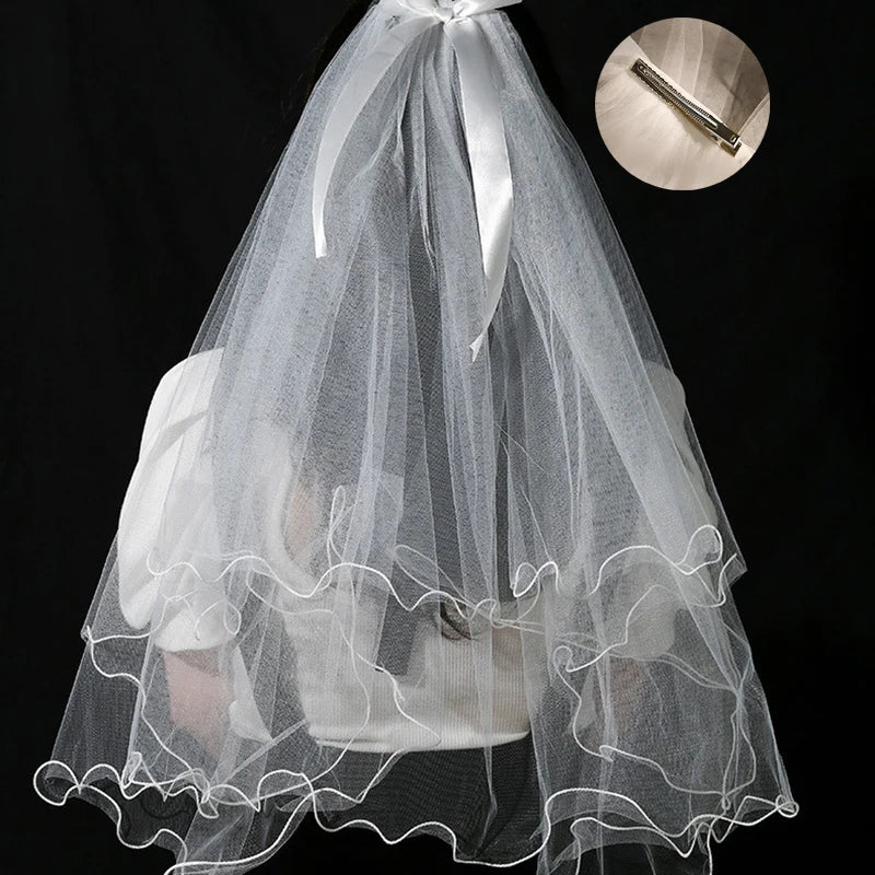 voile mariée tulle plissé blanc classique romantique fixé noeud transparent élégant